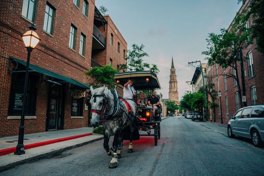 Charleston: Haunted Carriage Evening Tour - Entering Old South Carriage Company and meeting your horse